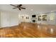 Spacious living room featuring hardwood floors, a fireplace, and an open layout at 1865 Briarlake Cir, Decatur, GA 30033