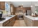Gourmet kitchen with stainless steel appliances, large counters, and stylish cabinetry at 210 Maycrest Path, Tucker, GA 30084