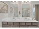 A spacious main bathroom featuring double sinks, quartz countertops, and modern cabinetry at 210 Maycrest Path, Tucker, GA 30084