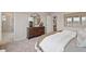 A luxurious main bedroom featuring a full ensuite at 210 Maycrest Path, Tucker, GA 30084