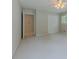 This bedroom boasts carpet flooring, a closet, and natural light coming in through the windows at 5841 Covered Wagon Trl, Lilburn, GA 30047