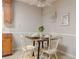 Kitchen eat-in area with a square table and seating for four at 5841 Covered Wagon Trl, Lilburn, GA 30047