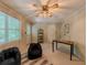 Spacious room with a ceiling fan and bright, natural light at 5841 Covered Wagon Trl, Lilburn, GA 30047