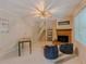 Inviting living room with a fireplace, beanbag chairs, and a staircase at 5841 Covered Wagon Trl, Lilburn, GA 30047