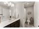 This is a primary bathroom featuring neutral walls and white sink at 5875 Windjammer Pt, Cumming, GA 30041