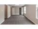 Spacious bedroom with plush carpeting, large windows, and ample closet space for storage and organization at 8541 Westchester Dr, Douglasville, GA 30134