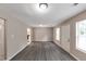 Spacious living room with vinyl plank floors and natural light, perfect for relaxing or entertaining guests at 8541 Westchester Dr, Douglasville, GA 30134