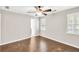 Bright bedroom features hardwood floors and windows providing natural light at 103 Sir Gregory Nw Mnr, Lawrenceville, GA 30044