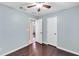 Inviting bedroom featuring hardwood floors and neutral wall paint at 103 Sir Gregory Nw Mnr, Lawrenceville, GA 30044