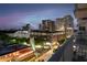 Balcony view showcasing vibrant night scene at 250 Pharr Ne Rd # 716, Atlanta, GA 30305