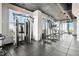 Bright community gym featuring modern weight lifting equipment, and floor to ceiling windows overlooking the city at 250 Pharr Ne Rd # 716, Atlanta, GA 30305