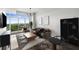 Bright living room with large windows, stylish furniture, and modern decor at 250 Pharr Ne Rd # 716, Atlanta, GA 30305