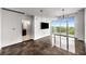 Spacious living area featuring modern design, large windows, and an adjacent bathroom at 250 Pharr Ne Rd # 716, Atlanta, GA 30305
