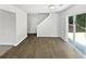 Bright living room with hardwood floors, and sliding glass doors at 7007 Setters Way, Lithonia, GA 30038