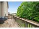 Spacious back deck overlooking the fenced backyard and lush greenery at 4415 Saint Andrews Crest Dr, Cumming, GA 30040