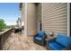 Relaxing back deck featuring outdoor seating and grilling area at 4415 Saint Andrews Crest Dr, Cumming, GA 30040