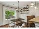 Cozy breakfast nook with lots of natural light and views of outdoor grill at 4415 Saint Andrews Crest Dr, Cumming, GA 30040