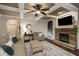 Inviting living room showcasing the stone fireplace and comfortable seating at 4415 Saint Andrews Crest Dr, Cumming, GA 30040