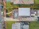 Aerial view of a house with a rooftop deck featuring seating, dining, and lounging areas at 522 Boulevard Ne Pl, Atlanta, GA 30308