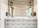 Modern bathroom with dual sinks, marble countertop, and stylish pendant lighting at 522 Boulevard Ne Pl, Atlanta, GA 30308