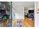 Bright and airy foyer with hardwood floors, a glass door, and a glimpse into the open-concept living space at 522 Boulevard Ne Pl, Atlanta, GA 30308