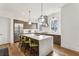 Modern kitchen boasts stainless steel appliances, stylish cabinets, and a large center island with seating at 522 Boulevard Ne Pl, Atlanta, GA 30308