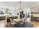 Open living space with island seating, a sleek fireplace, and a convenient wet bar area at 522 Boulevard Ne Pl, Atlanta, GA 30308