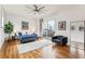 Bright main bedroom with large windows, hardwood floors, and access to a private balcony at 522 Boulevard Ne Pl, Atlanta, GA 30308