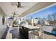 Outdoor kitchen with bar seating, grill and seating offers great views at 522 Boulevard Ne Pl, Atlanta, GA 30308