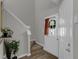 Bright entryway with a plant, a front door with sidelight, and a carpeted staircase at 6820 Gallant Se Cir # 2, Mableton, GA 30126