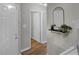Welcoming entryway with bright lighting, stylish mirror, and elegant flooring at 6820 Gallant Se Cir # 2, Mableton, GA 30126