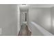 Bright hallway with neutral walls and light flooring connects the home's living spaces at 6820 Gallant Se Cir # 2, Mableton, GA 30126