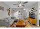 Cozy living room featuring a comfortable sofa, vibrant rug, stylish decor, and ample natural light at 6820 Gallant Se Cir # 2, Mableton, GA 30126