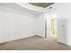 Cozy bedroom with carpeted floors and an en suite bathroom with a tub at 855 Peachtree Ne St # 2001, Atlanta, GA 30308