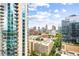 Stunning city view from high-rise balcony with blue skies and modern architecture creating a beautiful skyline at 855 Peachtree Ne St # 2001, Atlanta, GA 30308