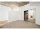 View of the closet with modular storage, and mirrored doors at 855 Peachtree Ne St # 2001, Atlanta, GA 30308
