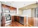 Modern kitchen with stainless steel appliances, granite countertops, and sleek cabinetry at 855 Peachtree Ne St # 2001, Atlanta, GA 30308