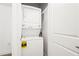 This in-unit laundry features a stacked washer and dryer at 855 Peachtree Ne St # 2001, Atlanta, GA 30308