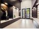 Elegant lobby with padded bench seating and modern design at 855 Peachtree Ne St # 2001, Atlanta, GA 30308