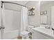 Bright bathroom showcasing a tub, shower with neutral tile surround, and a white vanity at 121 Danielle Ct, Villa Rica, GA 30180