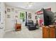 Sports-themed bedroom featuring a ceiling fan and view from the window at 121 Danielle Ct, Villa Rica, GA 30180