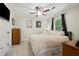 Relaxing bedroom with a ceiling fan, neutral walls, and a window for natural light at 121 Danielle Ct, Villa Rica, GA 30180