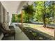 Charming front porch featuring outdoor seating and decorative hanging plants at 121 Danielle Ct, Villa Rica, GA 30180