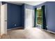 A view of a bedroom with closet and neutral colored carpet at 1741 Branch View Dr, Marietta, GA 30062