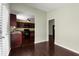 Dining room area with views of the kitchen and backyard sliding doors at 1741 Branch View Dr, Marietta, GA 30062