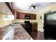 Kitchen area featuring a sink, cabinets, stainless steel appliances, and tile countertops at 1741 Branch View Dr, Marietta, GA 30062