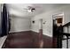 Bright living room with hardwood floors, ceiling fan, and access to kitchen at 1741 Branch View Dr, Marietta, GA 30062