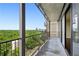Long balcony overlooking city views with metal railings and floor to ceiling sliding glass doors at 2233 Peachtree Ne Rd # 903, Atlanta, GA 30309