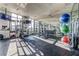 Well-lit gym offers various fitness equipment with large windows and mirrored walls for an open feel at 2233 Peachtree Ne Rd # 903, Atlanta, GA 30309