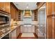 Well-equipped kitchen with stainless steel appliances, custom cabinetry, and granite countertops at 2233 Peachtree Ne Rd # 903, Atlanta, GA 30309